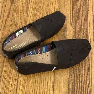 Black slip on TOMS